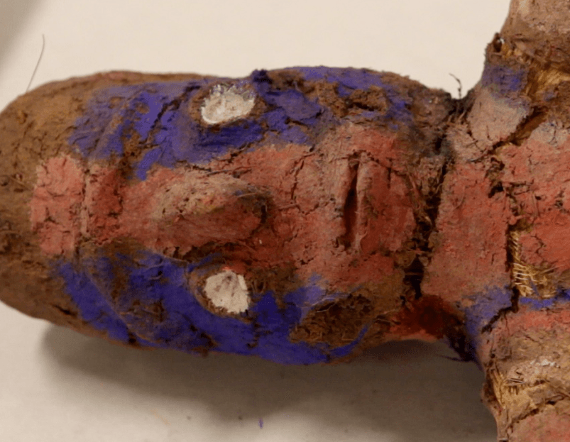 close-up of the face of a human figurine