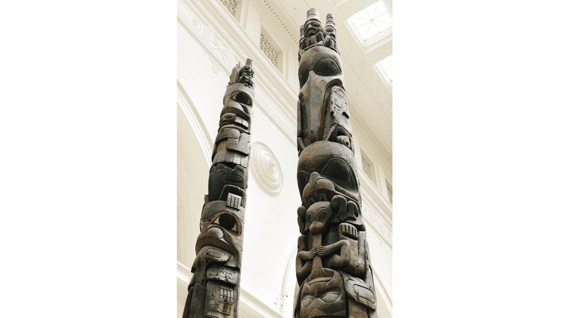 Two large carved totem poles